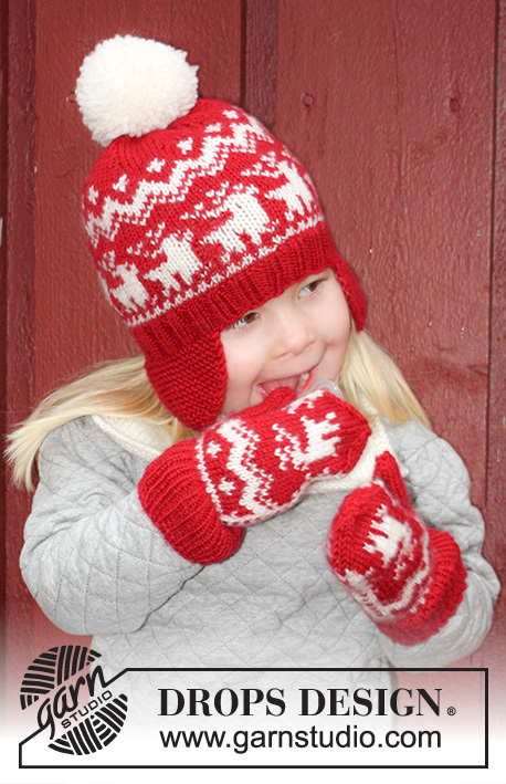 Prancing Around / DROPS Extra 0-1048 - Dziecięca czapka, rękawiczki i komin na drutach z włóczki DROPS Karisma. Z żakardem norweskim w renifery. Rozmiary 3 - 14 lat. Temat: Boże Narodzenie
