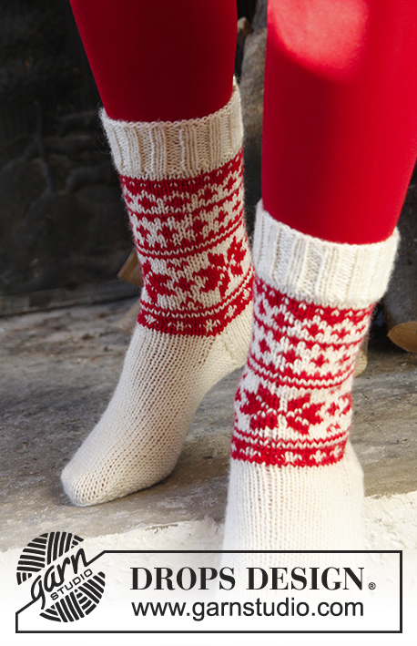 Cheerful Steps / DROPS Extra 0-1202 - DROPS Weihnachten: Gestrickte Socken mit Norwegermuster in DROPS Karisma. Gr. 32-43.