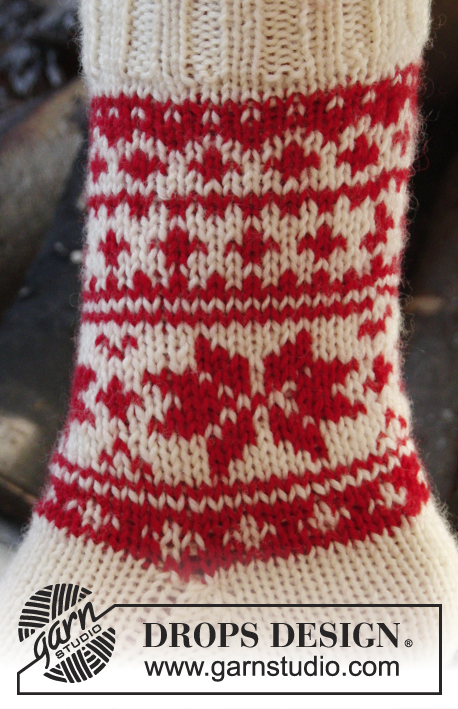 Cheerful Steps / DROPS Extra 0-1202 - DROPS Weihnachten: Gestrickte Socken mit Norwegermuster in DROPS Karisma. Gr. 32-43.