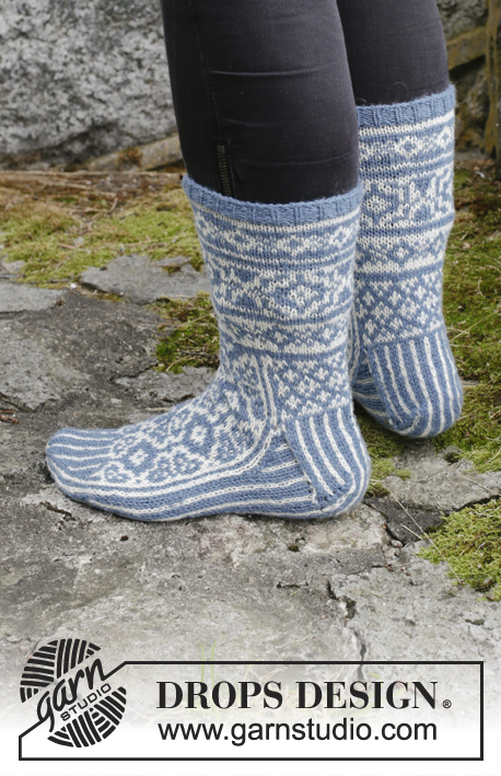 Frost Fighters / DROPS Extra 0-1414 - Stickade sockor med flerfärgat mönster till jul. Storlek 35 - 43. Arbetet är stickat i DROPS Fabel