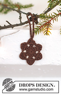 Gingerbread Stars / DROPS Extra 0-1554 - Pierniczki w kształcie gwiazdki na szydełku, z włóczki DROPS BabyMerino. Temat: Boże Narodzenie.