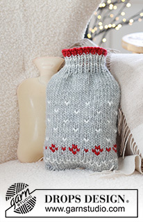 Christmas Sparkle Hot Bottle Cover / DROPS Extra 0-1582 - Alhaalta ylös neulottu lämminvesipullon suojus DROPS Snow-langasta. Työssä on raitoja tai kirjoneuletta. Teema: Joulu.