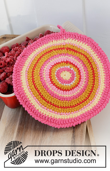 Spring Circle Potholders / DROPS Extra 0-1600 - Pegas crochetadas em DROPS Paris. Crochetam-se em redondo, com riscas e borbotos. Tema: Páscoa.
