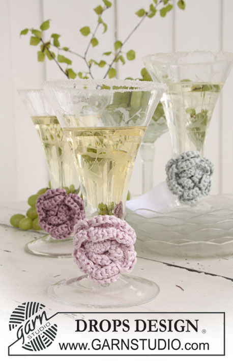 DROPS Extra 0-677 - Gehaakte DROPS bloem als decoratie voor glazen van ”Cotton Viscose”. 

