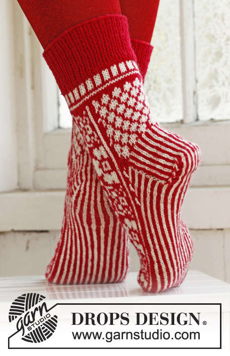 On Your Toes! / DROPS Extra 0-860 - Skarpetki świąteczne DROPS, z włóczki „Fabel”. Od 35 do 43.