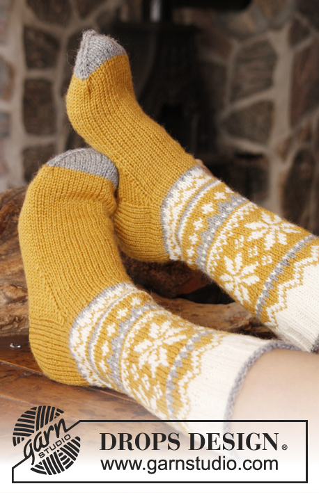 Chicken Legs / DROPS Extra 0-910 - DROPS Easter: Knitted DROPS socks with Norwegian pattern in ”Karisma”. 
Size 35 to 46
