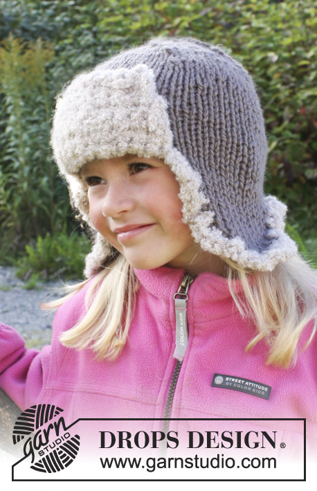 Ushanka / DROPS Extra 0-975 - Cappello DROPS con paraorecchie in Andes e bordo e risvolto all’uncinetto in Alpaca Bouclé . Taglie: dai 3 ai 12 anni.