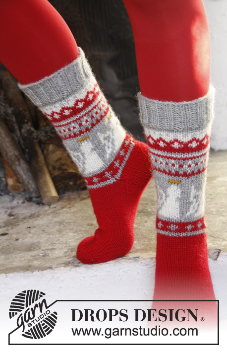 Angel Feet / DROPS Extra 0-989 - DROPS Kerst: gebreide DROPS sokken met engeltjes van ”Karisma”. Maat 32-43
