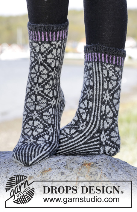 Starry Night Socks / DROPS 166-25 - Stickade DROPS sockor i ”Karisma” med nordiskt mönster.
Stl 35-43.
