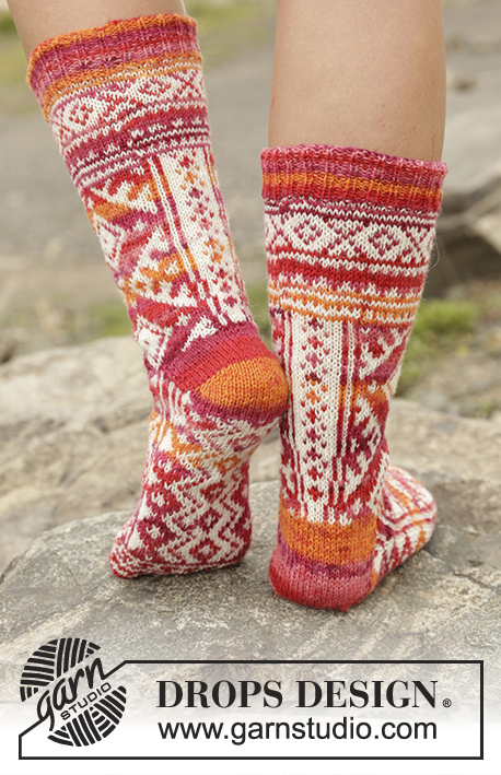 Mexican Sunset / DROPS 170-11 - Knitted DROPS socks with Nordic pattern worked from toe up in ”Fabel”. Size 35 - 43