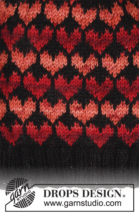 Queen of Hearts / DROPS 183-23 - Komplet składa się z: czapki i rękawic na drutach, z sercami. 
Z włóczki DROPS Fabel.