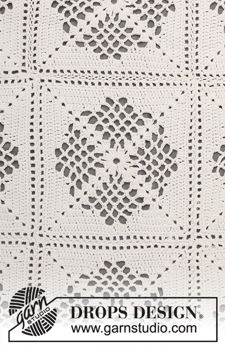 Asta / DROPS 198-4 - Manta a ganchillo en DROPS Safran. La pieza está elaborada con patrón de calados y cuadrados.
