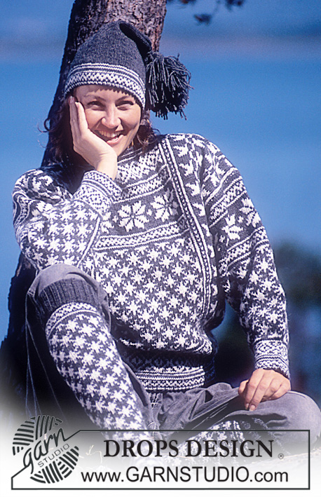 DROPS 20-23 - Sweter, skarpetki i czapka na drutach, z żakardem norweskim, z włóczki DROPS Karisma. Wersja damska i męska. Od S – L.