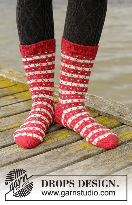 Candy Cane Lane Socks / DROPS 203-26 - Knitted socks with Nordic Fana pattern in DROPS Karisma. The piece is worked top down. Sizes 35 - 43 = 5 – 10 1/2.
