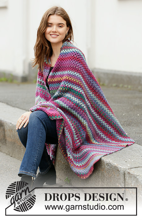 True Colours / DROPS 203-6 - Crocheted blanket in DROPS Delight. Crocheted in stripes with treble crochet groups.