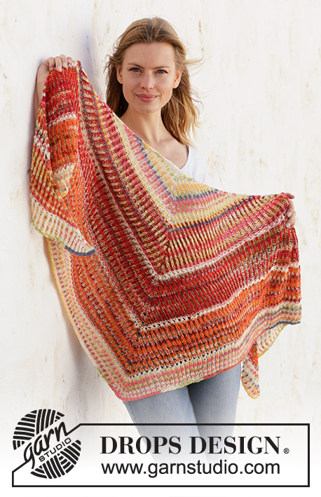 Phoenix Wrap / DROPS 212-21 - Knitted shawl with 2 coloured English rib in DROPS Fabel. Piece is knitted top down , with stripes and eyelet rows.