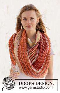 Phoenix Wrap / DROPS 212-21 - Knitted shawl with 2 coloured English rib in DROPS Fabel. Piece is knitted top down , with stripes and eyelet rows.