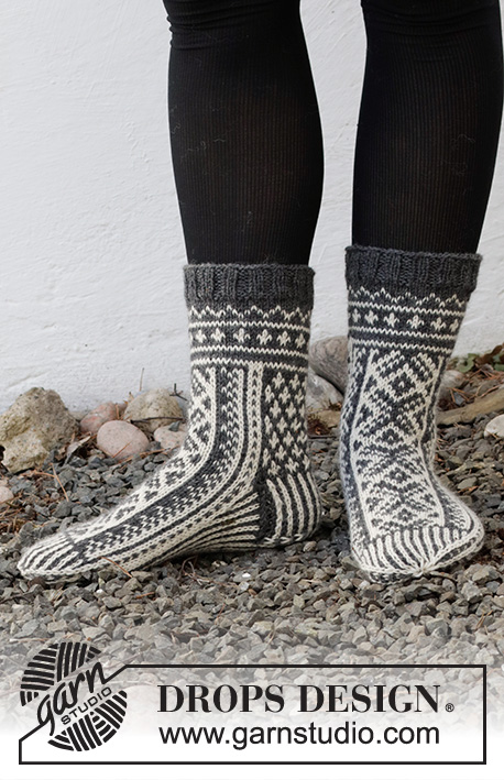 Sleigh Ride / DROPS 214-63 - Strikkede sokker i DROPS Lima. Arbejdet strikkes oppefra og ned med nordisk mønster. Størrelse 35 - 43. Tema: Jul