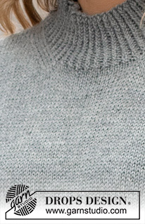 Grey Stone Hill / DROPS 228-29 - Knitted vest / slipover in DROPS Karisma. Piece is knitted with high neck, rib on edges and vents in the sides. Size: S - XXXL