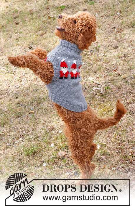 Merry Santas / DROPS 228-54 - Sweter / świąteczny sweter dla psa na drutach z włóczki DROPS Alaska, z żakardem norweskim. Od XS do M. Temat: Boże Narodzenie.