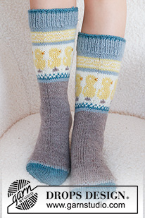 Dancing Chicken Socks / DROPS 229-33 - Knitted socks in DROPS Karisma. The piece is worked top down, with multi-colored pattern and Easter chicks. Sizes 35 – 46 = US 4 1/2 - 12 1/2.. Theme: Easter.