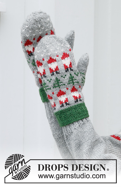 Christmas Time Mittens / DROPS 234-61 - Rękawiczki na drutach, z włóczki DROPS Karisma. Przerabiane od dołu do góry, z żakardem w Mikołaje i choinki. Temat: Boże Narodzenie.