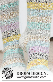 Sunset Dance Socks / DROPS 234-70 - Skarpetki na drutach, przerabiane od góry do dołu, złamanym ściegiem ryżowym, z włóczki DROPS Fabel. Od 35 do 43.