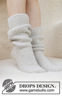 Snow White Socks / DROPS 234-73 - Meias tricotadas em DROPS Lima e DROPS Brushed Alpaca Silk. Tricotam-se de cima para baixo, em ponto de arroz. Do 35 ao 43. Tema: Natal.
