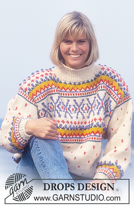 Threads of Sunshine / DROPS 24-2 - DROPS sweater with pattern borders in “Alaska”. Ladies and Men’s size S – L.