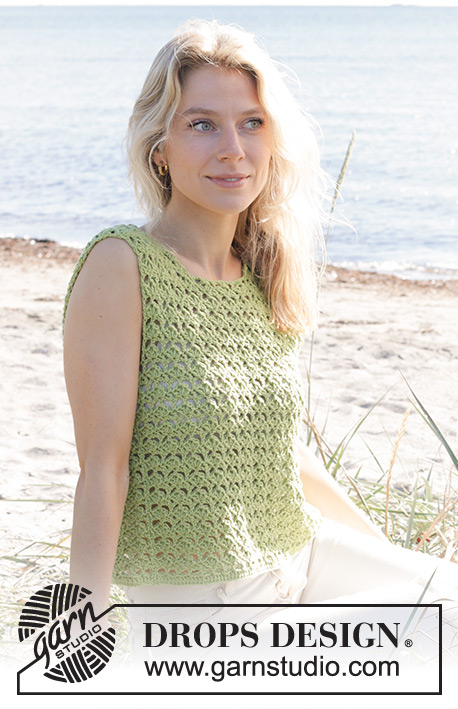 Boogie Nights Top / DROPS 241-23 - Crocheted top in DROPS Cotton Merino. The piece is worked bottom up with fan-pattern and split in sides. Sizes S - XXXL.
