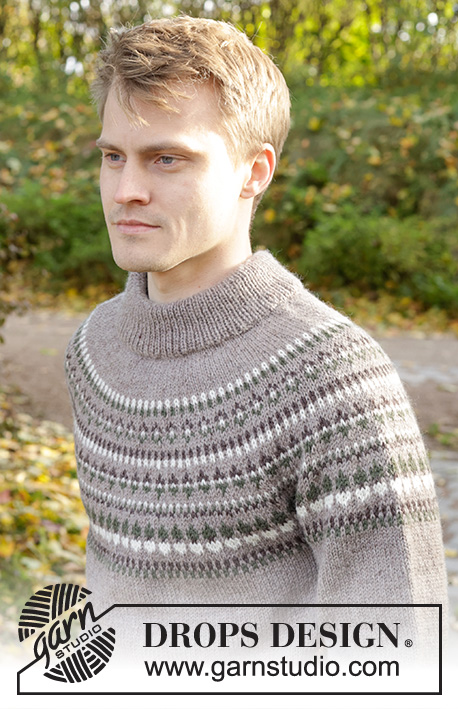 Boreal Circle / DROPS 246-9 - Męski sweter na drutach, przerabiany od góry do dołu, z włóczki DROPS Karisma. Z zaokrąglonym karczkiem, żakardem norweskim i podwójnym wykończeniem dekoltu. Od S do XXXL.