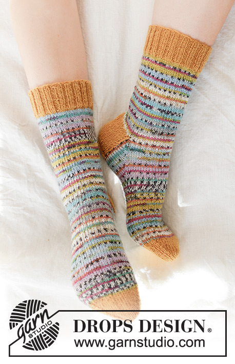 Spring Carnival Socks / DROPS 247-16 - Knitted socks in DROPS Fabel. Piece is knitted top down in stocking stitch. Size 35 to 43