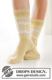 Easter Promenade Socks / DROPS 247-21 - Knitted socks in DROPS Nord. The piece is worked top down, with Nordic pattern and heel flap. Sizes 35 – 43 = US 4 1/2 – 12 /2. Theme: Easter.