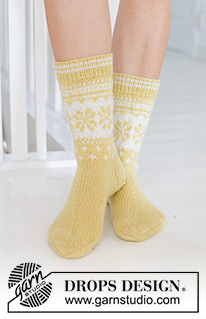 Easter Promenade Socks / DROPS 247-21 - Knitted socks in DROPS Nord. The piece is worked top down, with Nordic pattern and heel flap. Sizes 35 – 43 = US 4 1/2 – 12 /2. Theme: Easter.