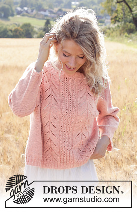 Pink Paradise / DROPS 248-14 - Raglánový pulovr s copánkovým a ažurovým vzorem pletený shora dolů z příze DROPS Flora nebo DROPS Baby Merino. Velikost S - XXXL.