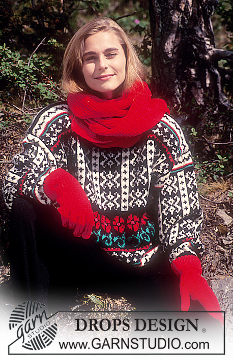 DROPS 28-16 - Sweter na drutach, z żakardem w róże i gwiazdy, szalik i rękawiczki na drutach, z włóczki DROPS Karisma. Od S do L.