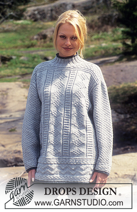 DROPS 47-11 - Irlandzki sweter Aran na drutach z włóczki DROPS Karisma Superwash