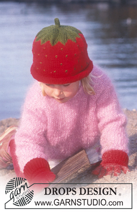 Berry Baby / DROPS Baby 10-23 - Gorro morango tricotado em DROPS Karisma Superwash nos tamanhos 1/6 meses–8 anos. Pulôver em DROPS Vienna nos tamanhos 2–8 anos e Mitenes em DROPS Karisma nos tamanhos 2-8 anos.