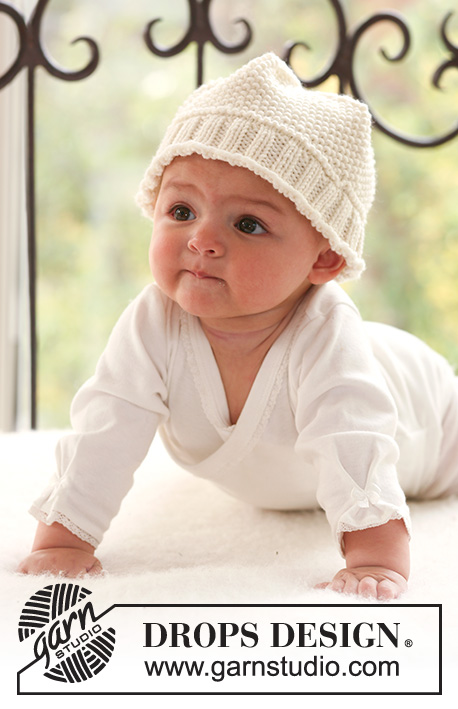Pearly Cheeks / DROPS Baby 18-27 - Cappello lavorato ai ferri a grana di riso e coste, per neonati e bambini in DROPS Merino Extra Fine.