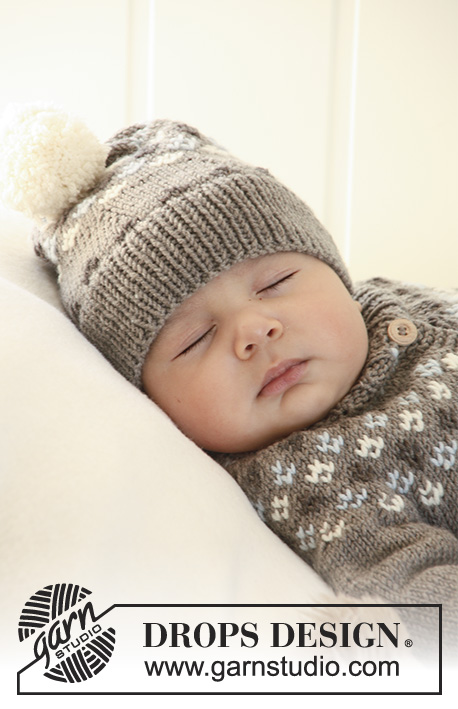 First Snow / DROPS Baby 19-2 - Settiin kuuluu: Vauvan ja lapsen raglanjakku korkealla kauluksella, myssy ja kuviolliset sukat DROPS Merino Extra Fine -langasta. 