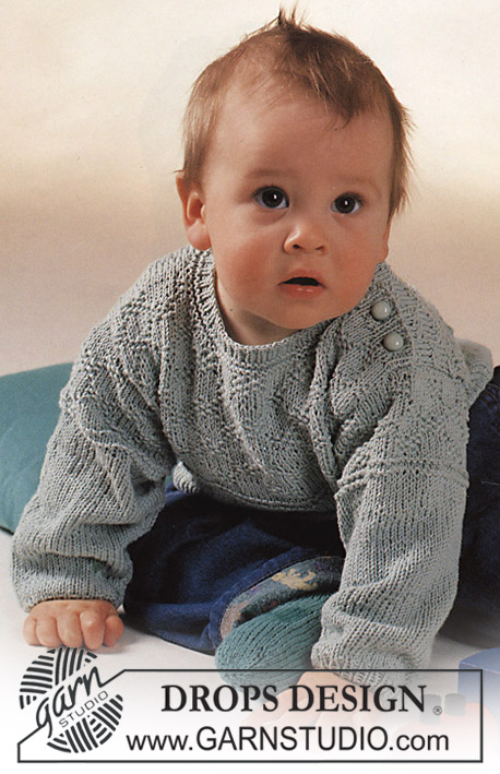 DROPS Baby 2-12 - DROPSi tekstuurse mustriga džemper ja sokid lõngast “Safran”. 