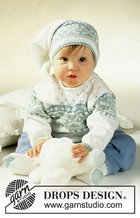 Nighty Night / DROPS Baby 2-13 - Kuviollinen DROPS setti ”Camelia”-langasta: DROPS pusero, housut, myssy, sukat ja käsineet.