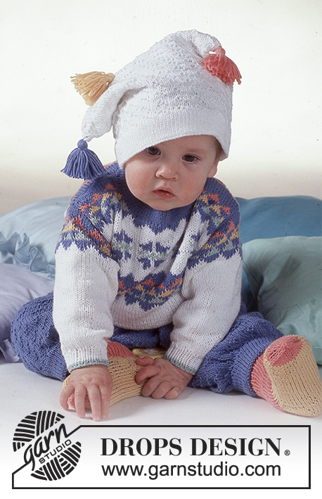 Arlequin Ensemble / DROPS Baby 2-14 - DROPS jumper with star pattern, trousers, hat and socks in “Camelia”.