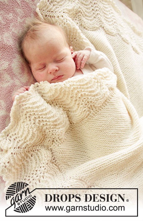 Baby Bliss / DROPS Baby 25-2 - Dětská deka pletená vroubkovým vzorem s vlnkovým lemem z příze DROPS BabyMerino
