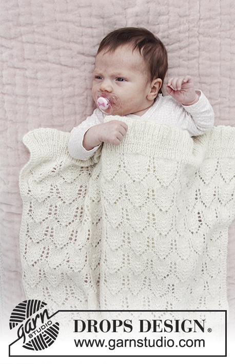 Sweet Peonies / DROPS Baby 29-14 - Deka s ažurovým vzorem pletená z příze DROPS Alpaca.