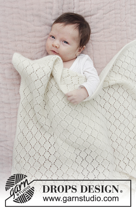 Lay Down / DROPS Baby 29-8 - Couverture au tricot bébé avec point ajouré. Se tricote en DROPS BabyMerino