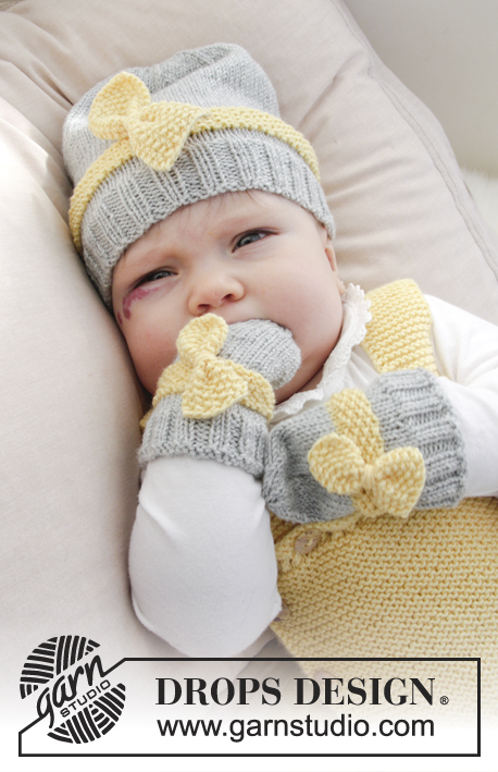 Little Miss Ribbons / DROPS Baby 31-11 - Settiin kuuluu: Vauvan neulotut rusetilliset myssy ja käsineet. Koot keskonen - 4 vuotta. Setti neulotaan DROPS BabyMerino -langasta.