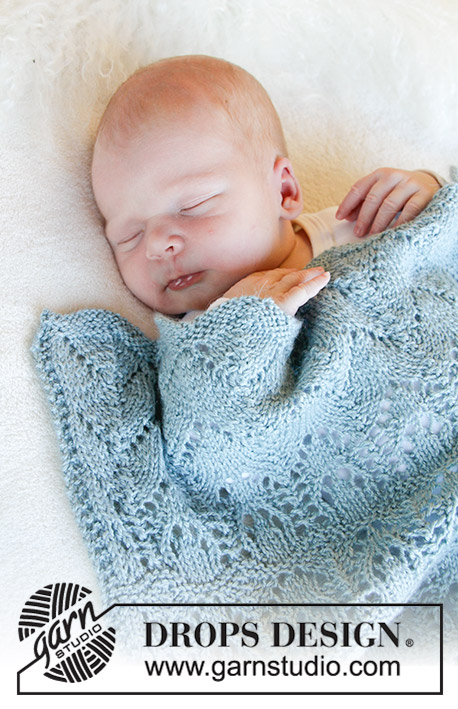 Milk Dreams / DROPS Baby 31-23 - Couverture bébé tricotée avec point ajouré, en DROPS BabyMerino. Thème: Couverture bébé