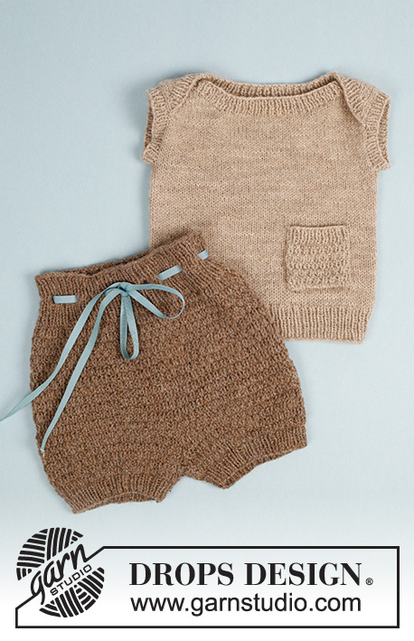 Shorts and Sweet / DROPS Baby 33-23 - Pantaloncini corti per bambini lavorati ai ferri con motivo a punto fantasia in DROPS Flora. Taglie: Prematuri – 2 anni.