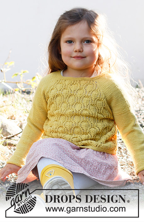 Sweet Marigold Sweater / DROPS Baby & Children 38-12 - Dziecięcy sweter na drutach, przerabiany od góry do dołu, z reglanowymi rękawami i ściegiem ażurowym, z włóczki DROPS BabyMerino. Od 6 miesięcy do 8 lat.
